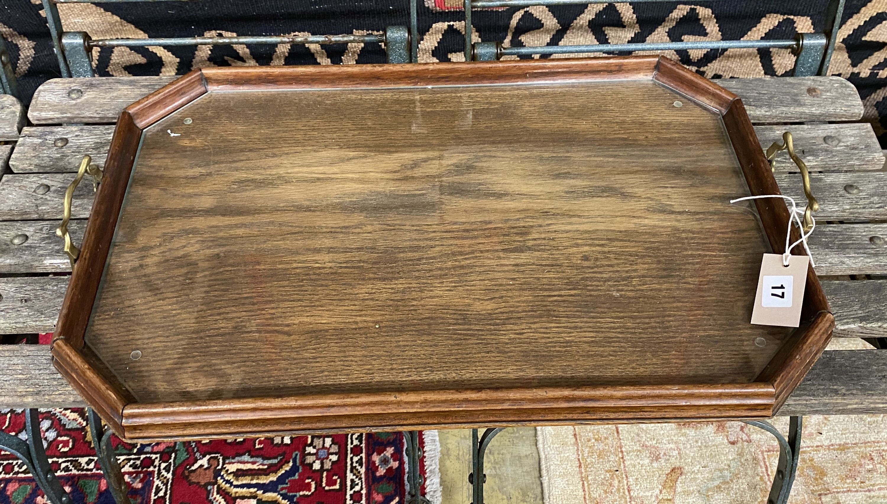 An Edwardian octagonal oak twin handled tray, length 62cm, depth 40cm
